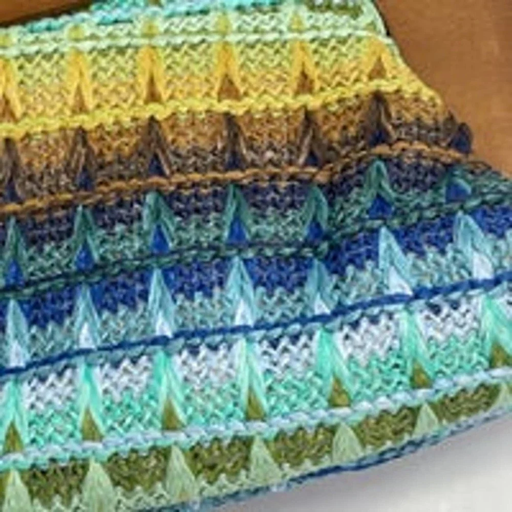 Urban Expressions vibrantly colored clutch bag